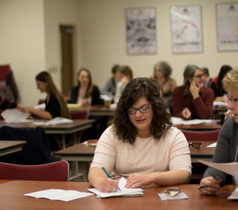 A KMA Member takes notes during the annual conference.